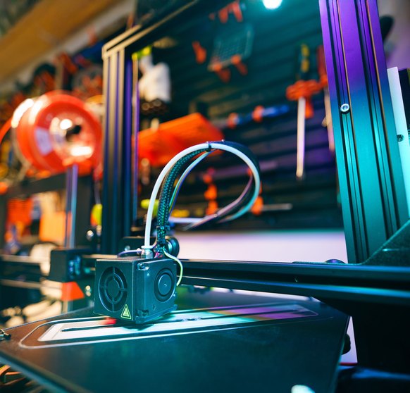 Desktop 3D printer in a workshop